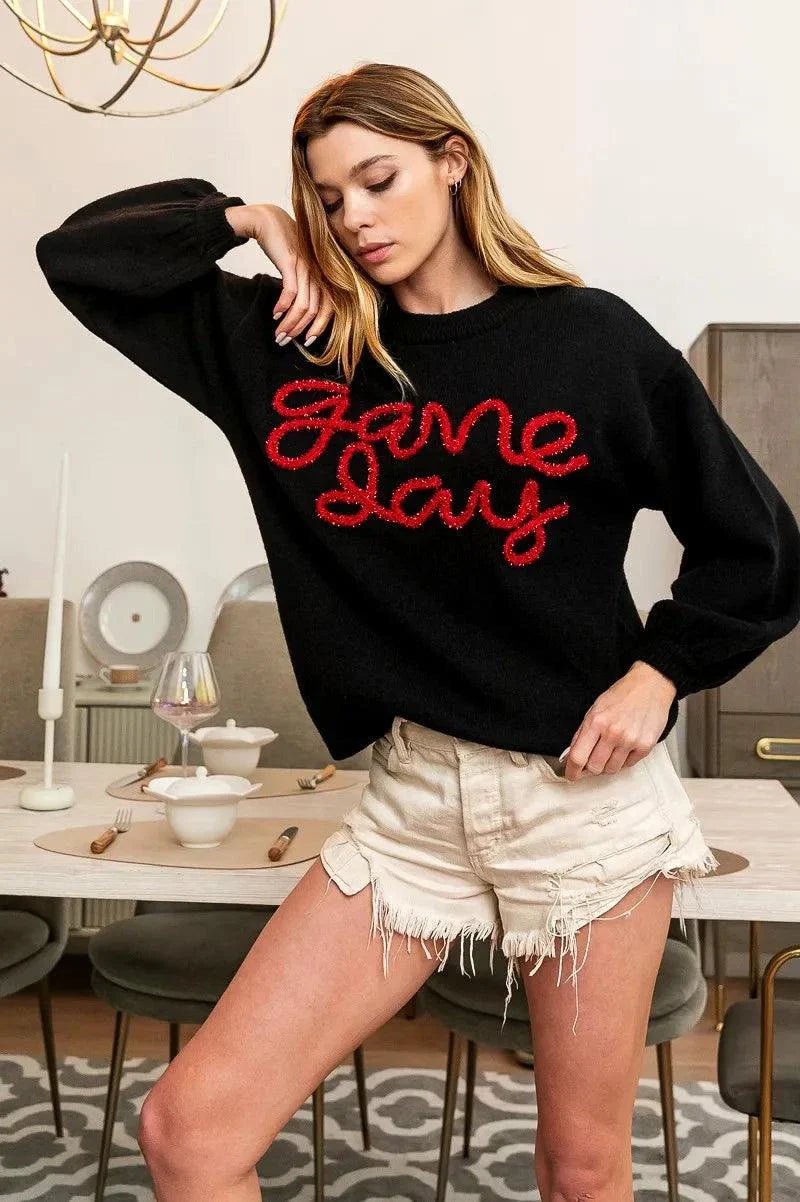 BiBi Game Day Metallic Letter SweaterShow your team spirit in style with this Game Day Metallic Letter Sweater. The metallic letter design adds a touch of glamour and sparkle to this sweater, perfect foRedemption By Ashley NorthGame Day Metallic Letter Sweater
