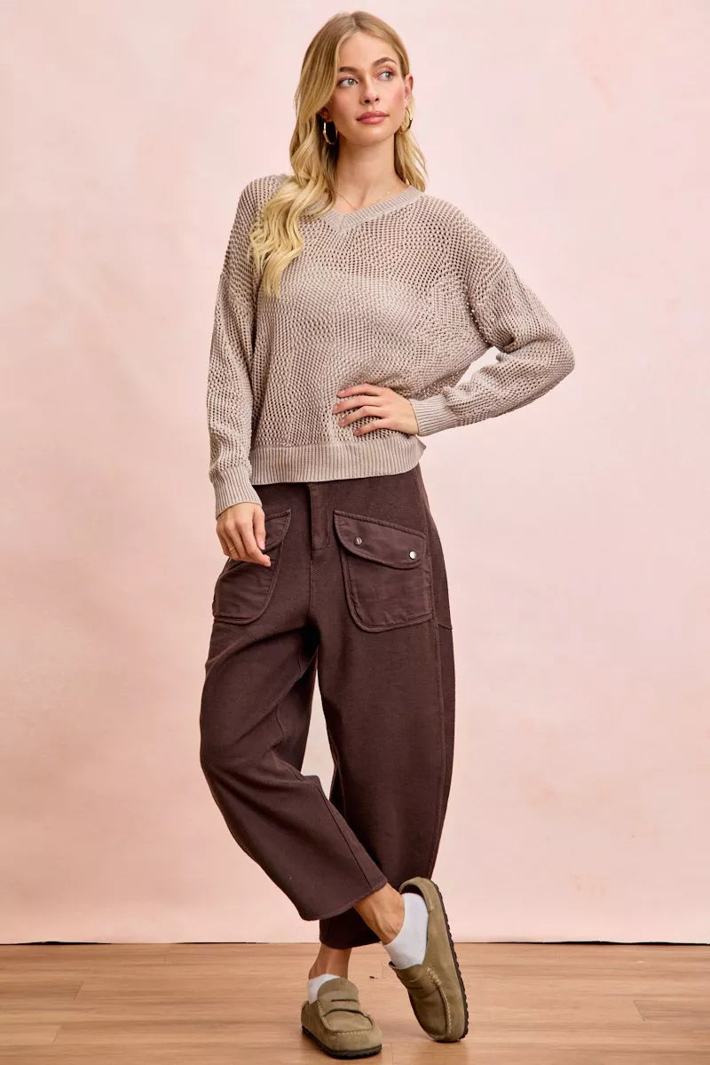Woman wearing BiBi Washed Terry Pants with pockets and a beige sweater in casual outfit
