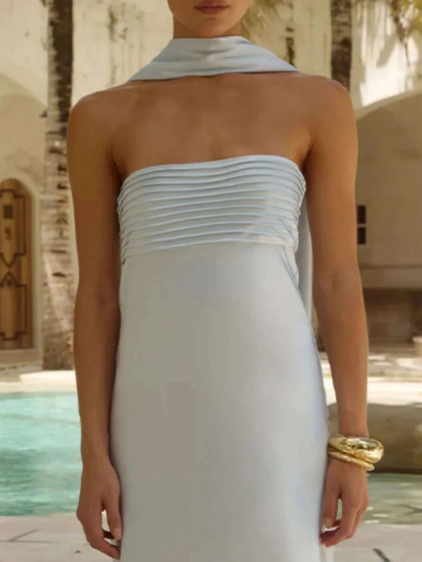 Light blue tube mermaid maxi dress with pleated bodice and strapless design by poolside