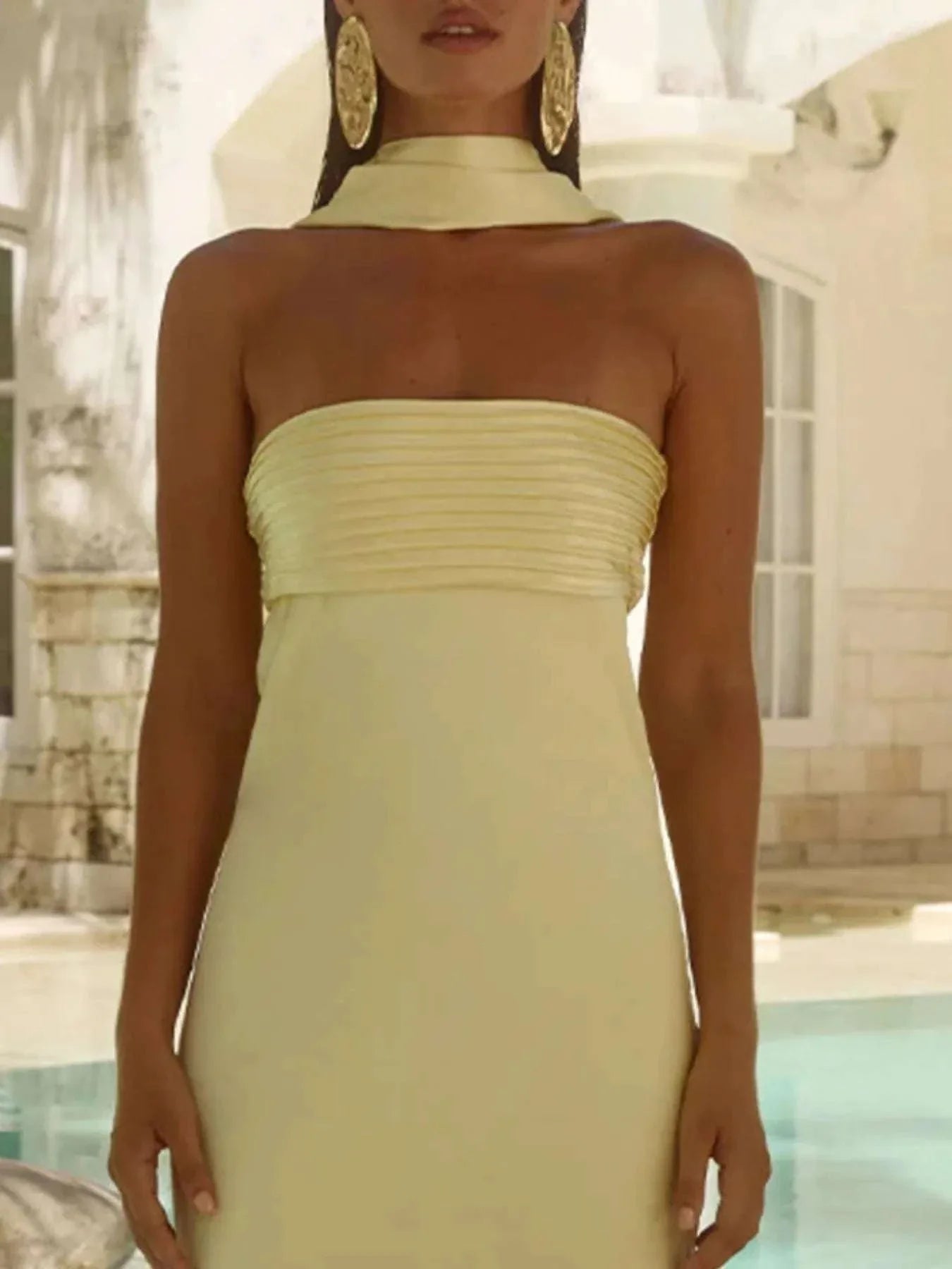 Yellow tube mermaid maxi dress with pleated bodice and sleeveless design