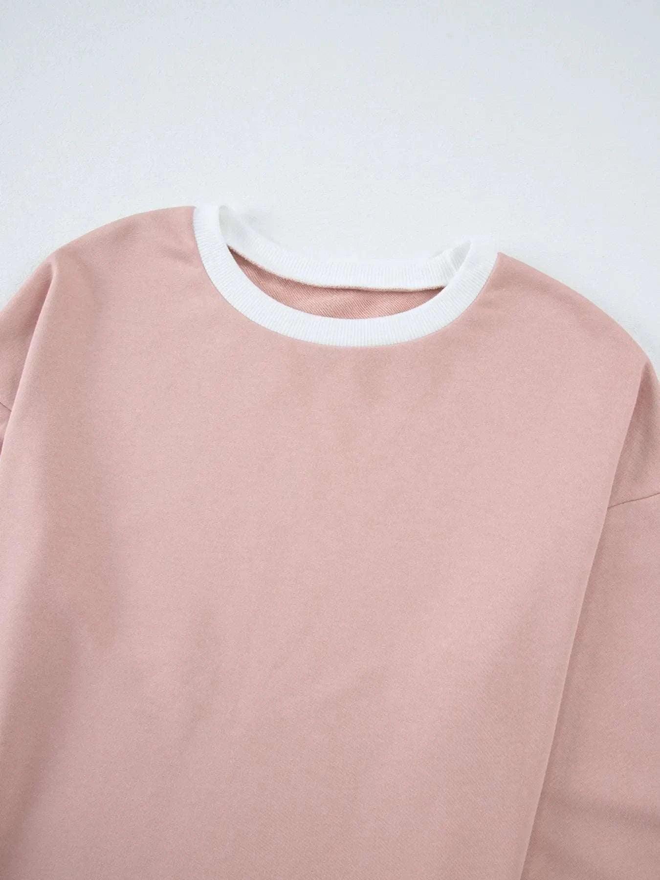 Pink Contrast Trim Round Neck Top with white collar detail, made from slightly stretchy polyester and spandex blend.