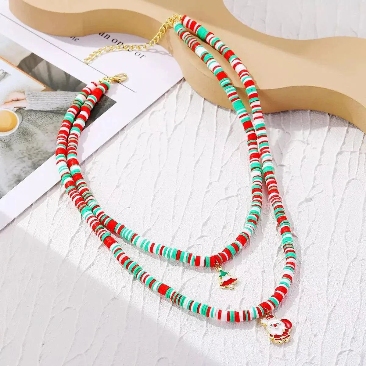 Alloy Christmas Necklace with Santa and Christmas Tree pendant in festive red, white, and green beads