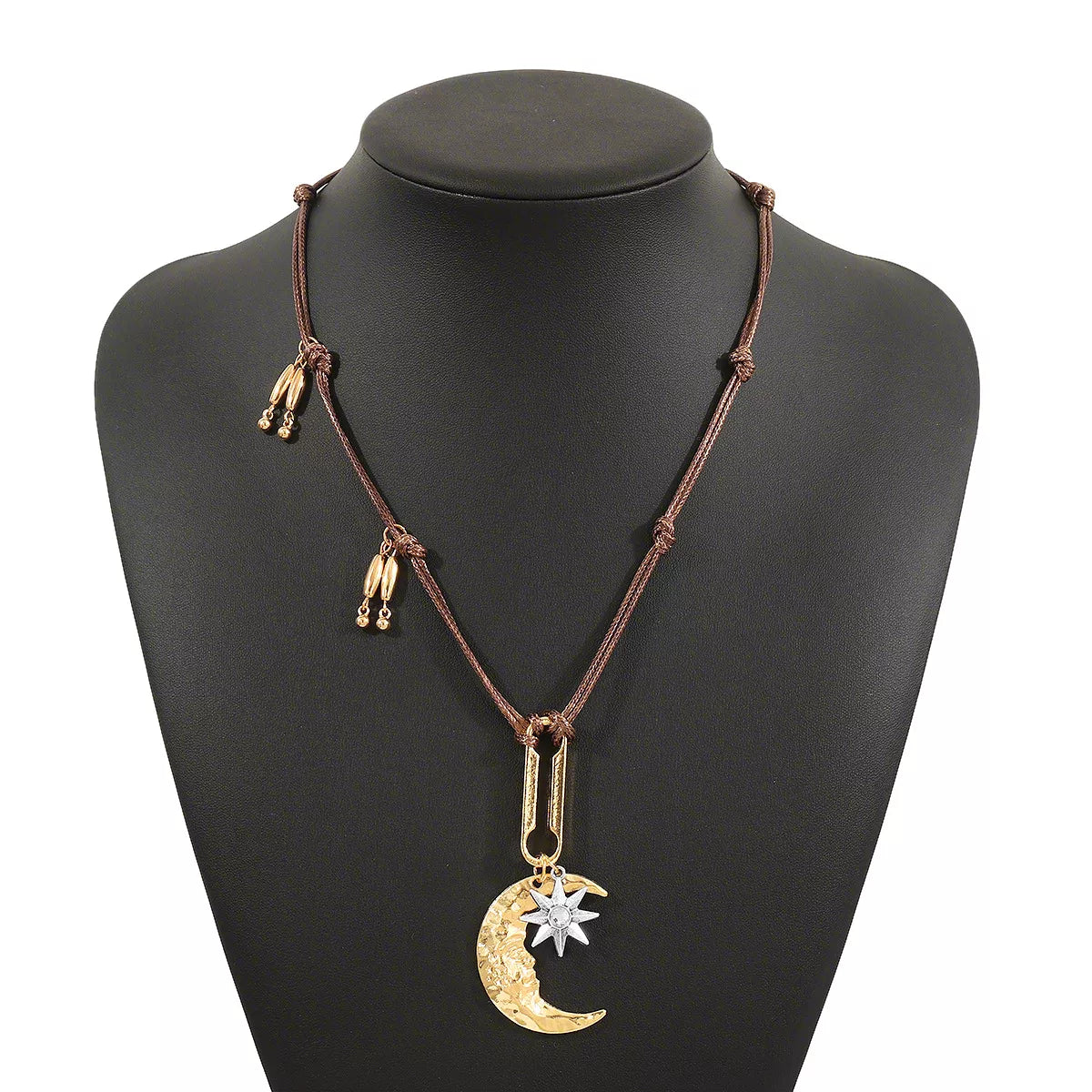 Moon & Sun Pendant necklace with 18K gold-plated crescent moon and silver-plated star on brown cord