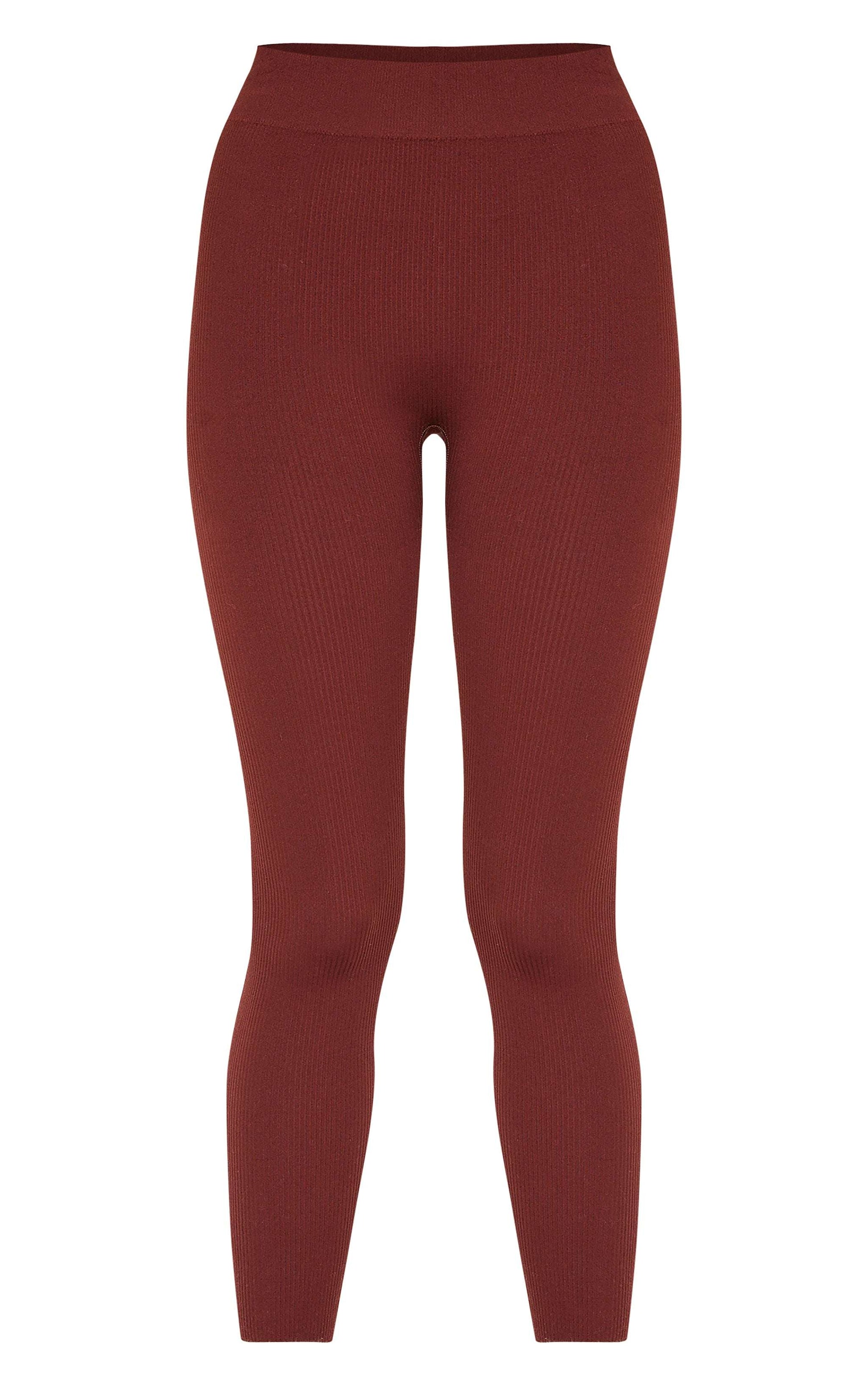 Structured contour ribbed leggings in black for a sculpted silhouette and off-duty chic look