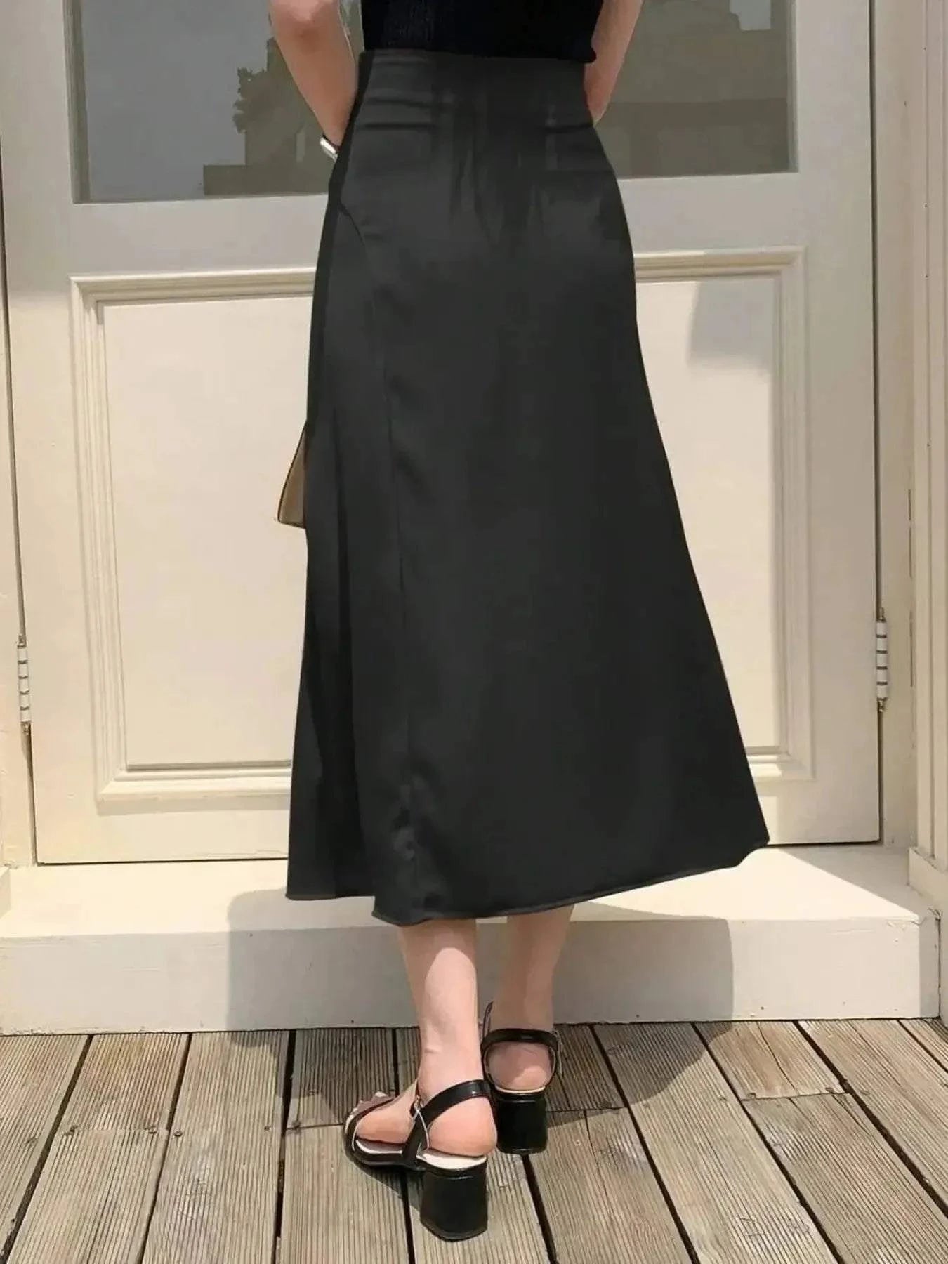 Asymmetric Midi Skirt with Fluted Hem.