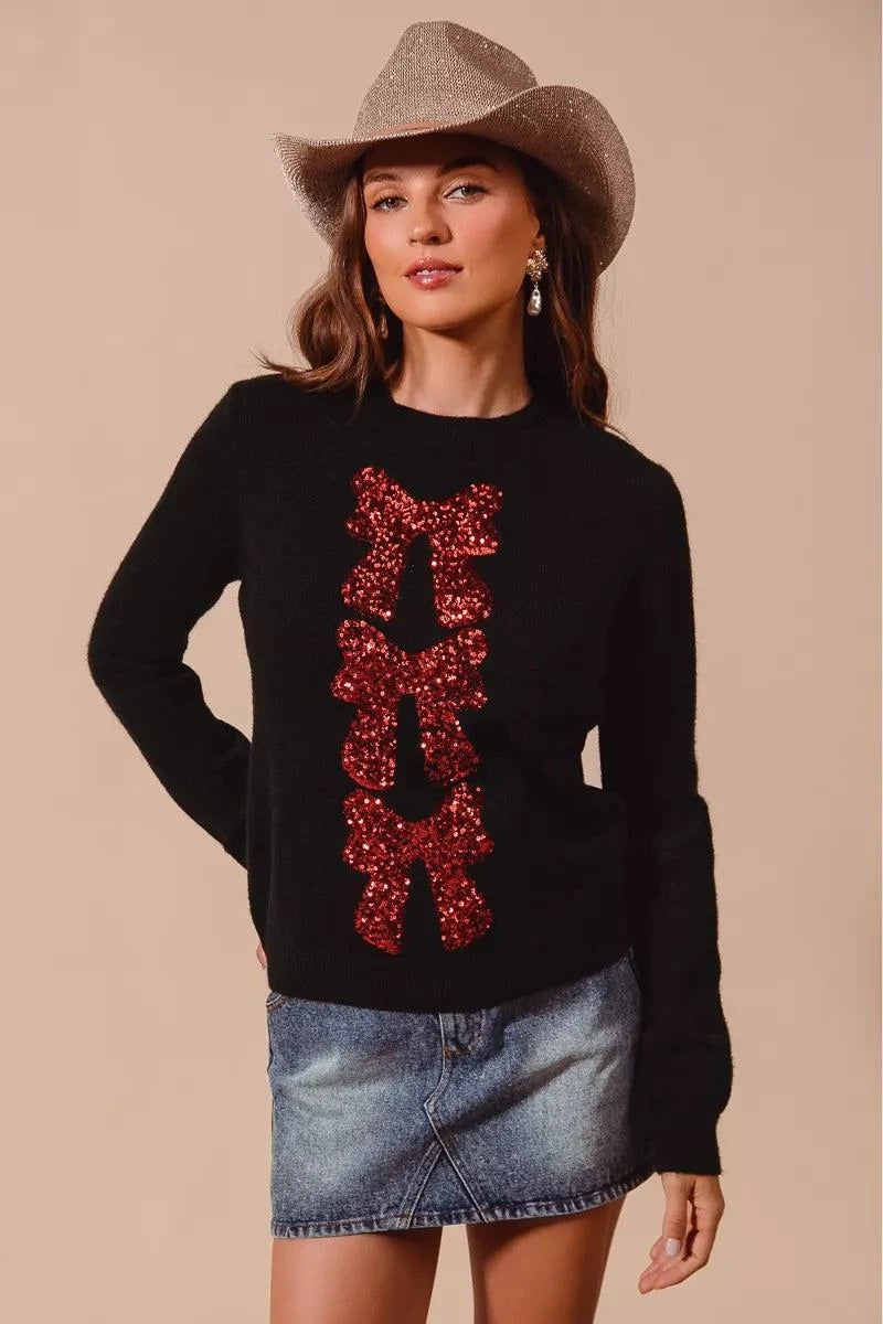 SO ME Sequins Bow Ribbon Embellished Christmas SweaterThis Christmas sweater is embellished with sparkly sequins and a charming bow ribbon for a festive and eye-catching look. The sequins add a touch of glamour and shimRedemption By Ashley NorthSequins Bow Ribbon