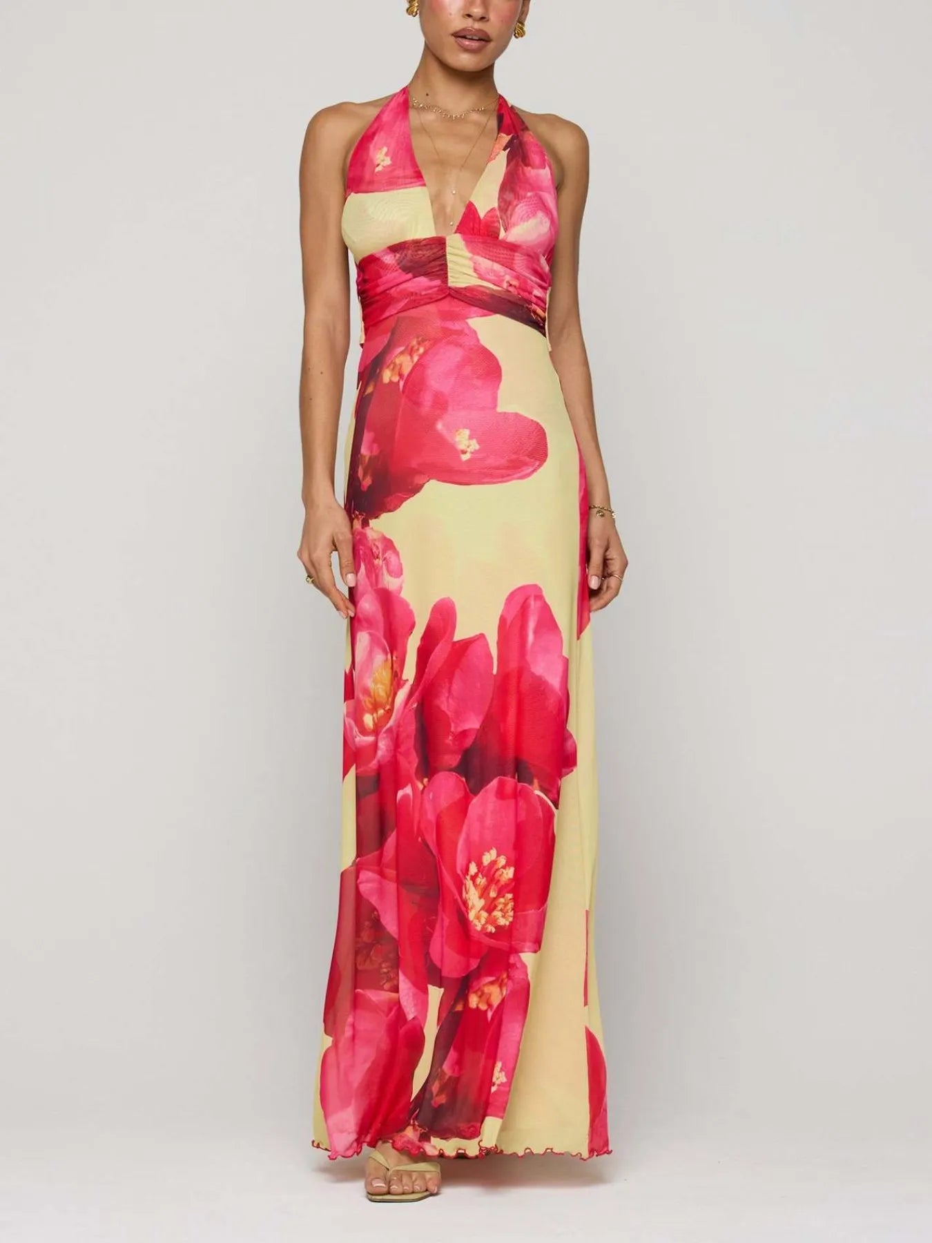 Floral Maxi Dress with Halter Neck and Deep V Design.