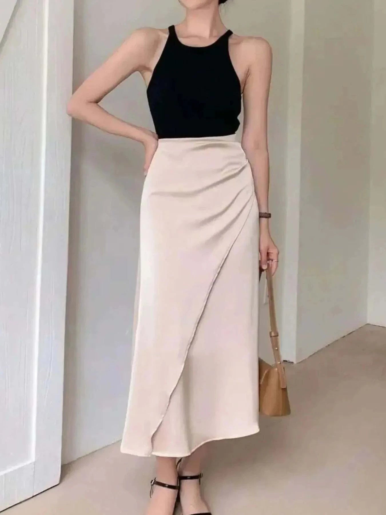 Asymmetric Midi Skirt with Fluted Hem.