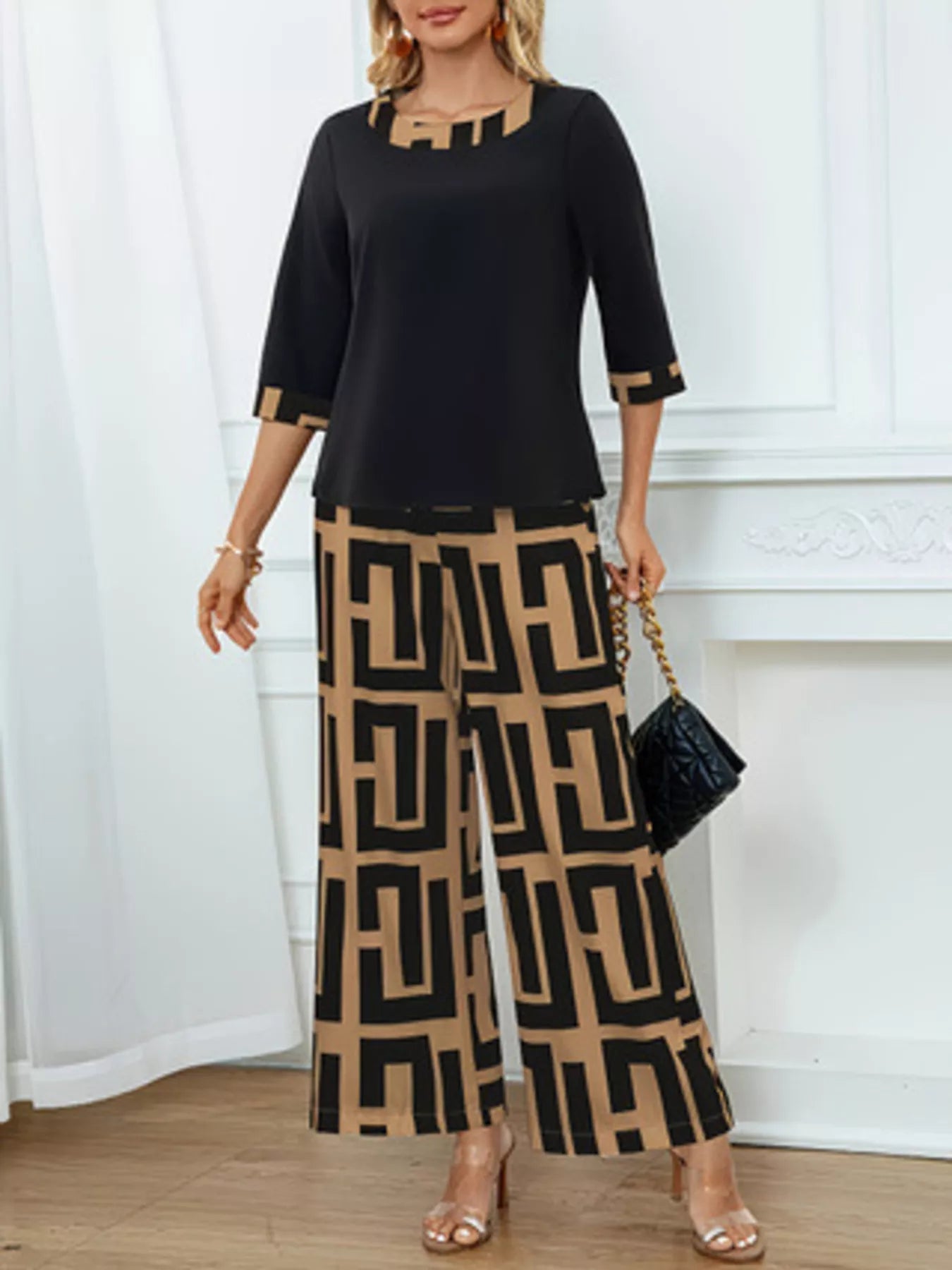 Geometric print round neck top paired with pocketed wide-leg pants two-piece set
