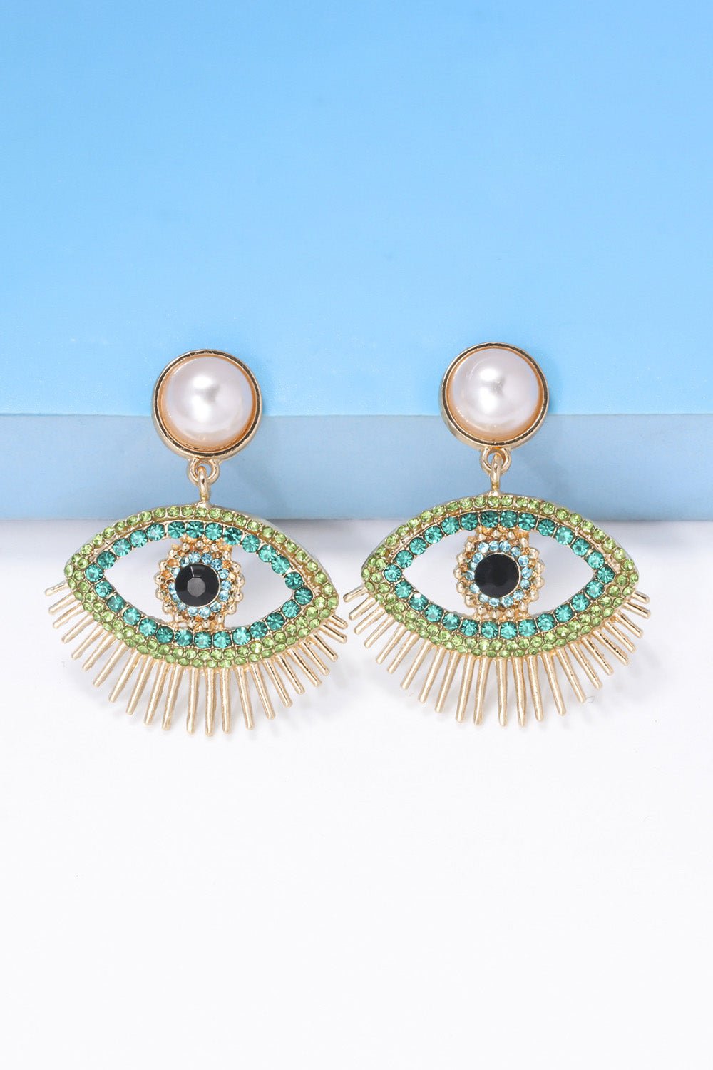 Evil eye shape rhinestone and synthetic pearl dangle earrings with zinc alloy setting