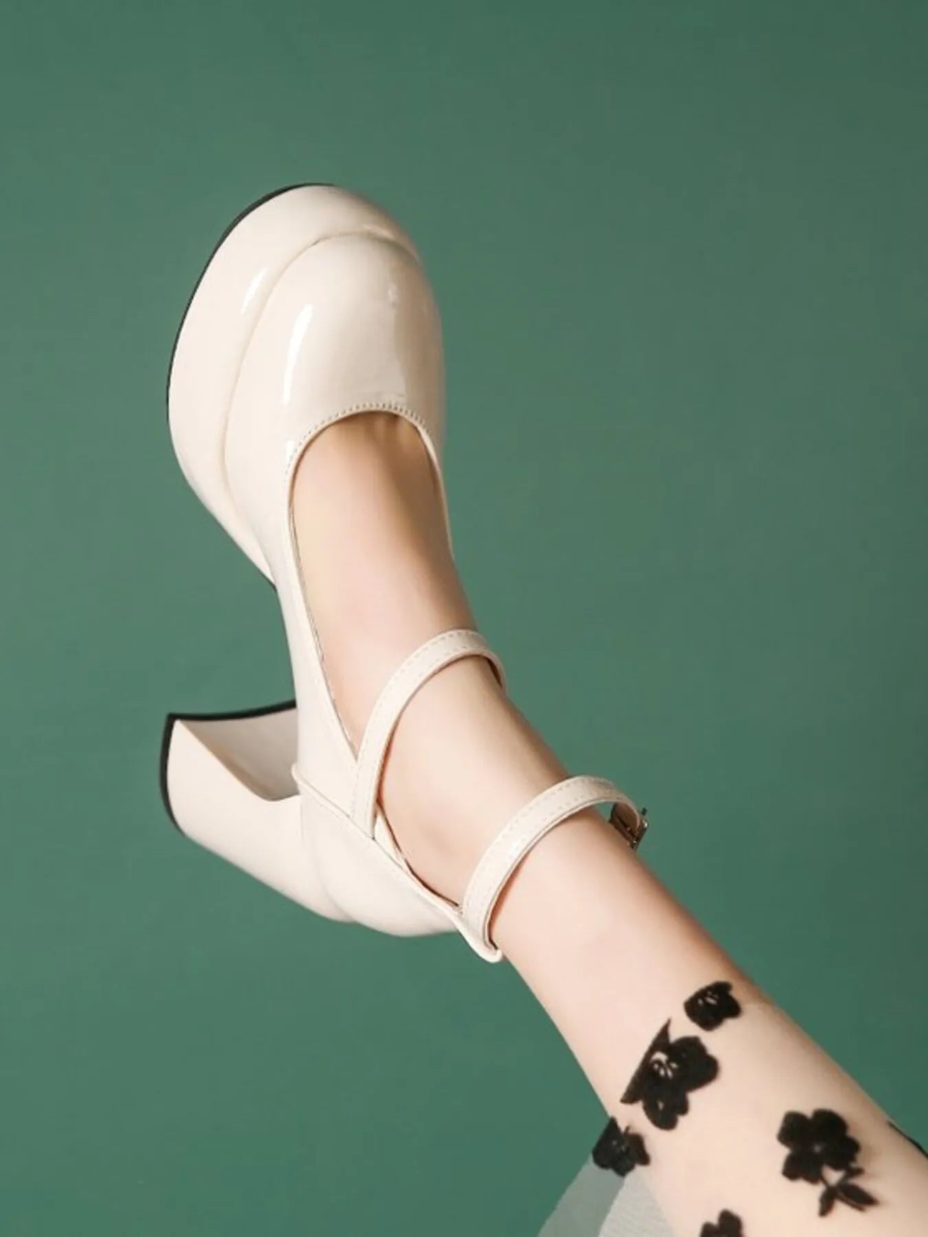 Patent Leather Mary Jane Platform Pumps.