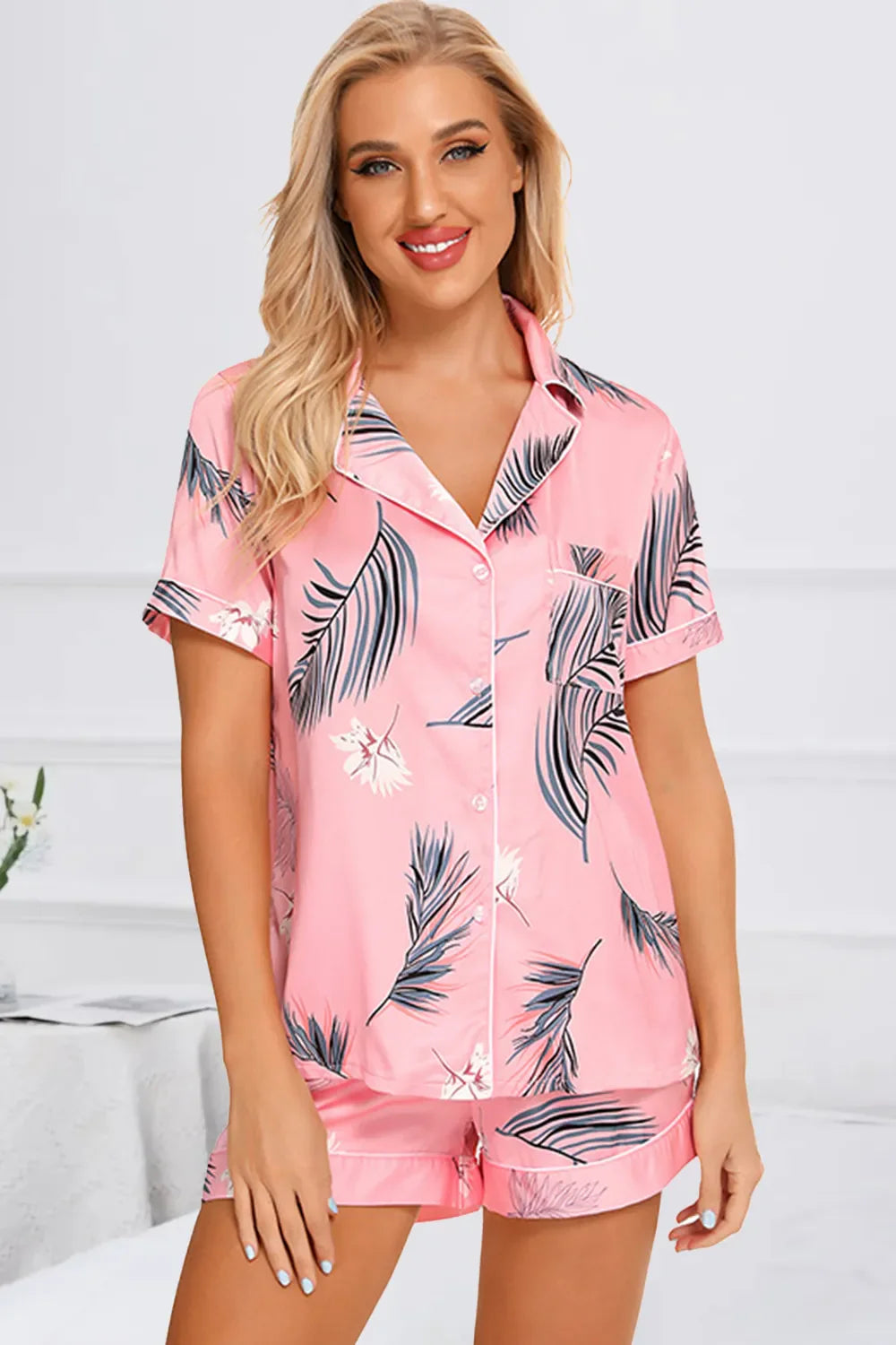 Pink printed button up short sleeve top and shorts lounge set with leaf pattern