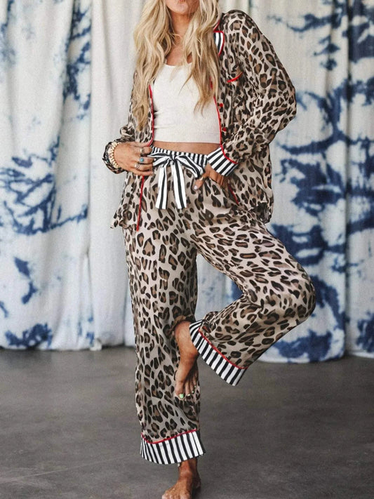 Woman wearing leopard and striped trim shirt and pants set with drawstring waist and pockets