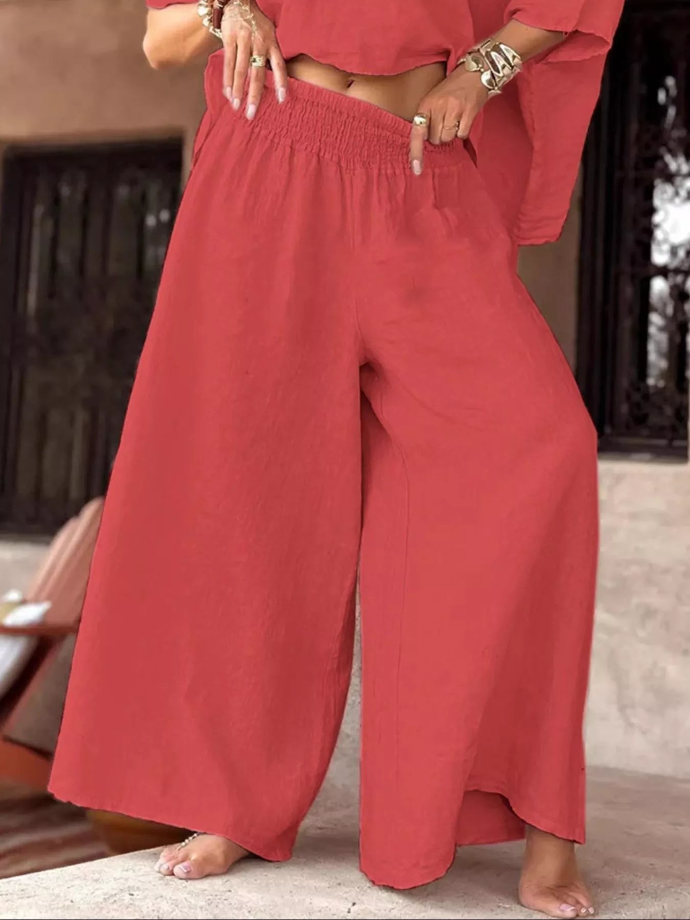 Plus size full size boat neck top and wide leg pants set in red polyester blend