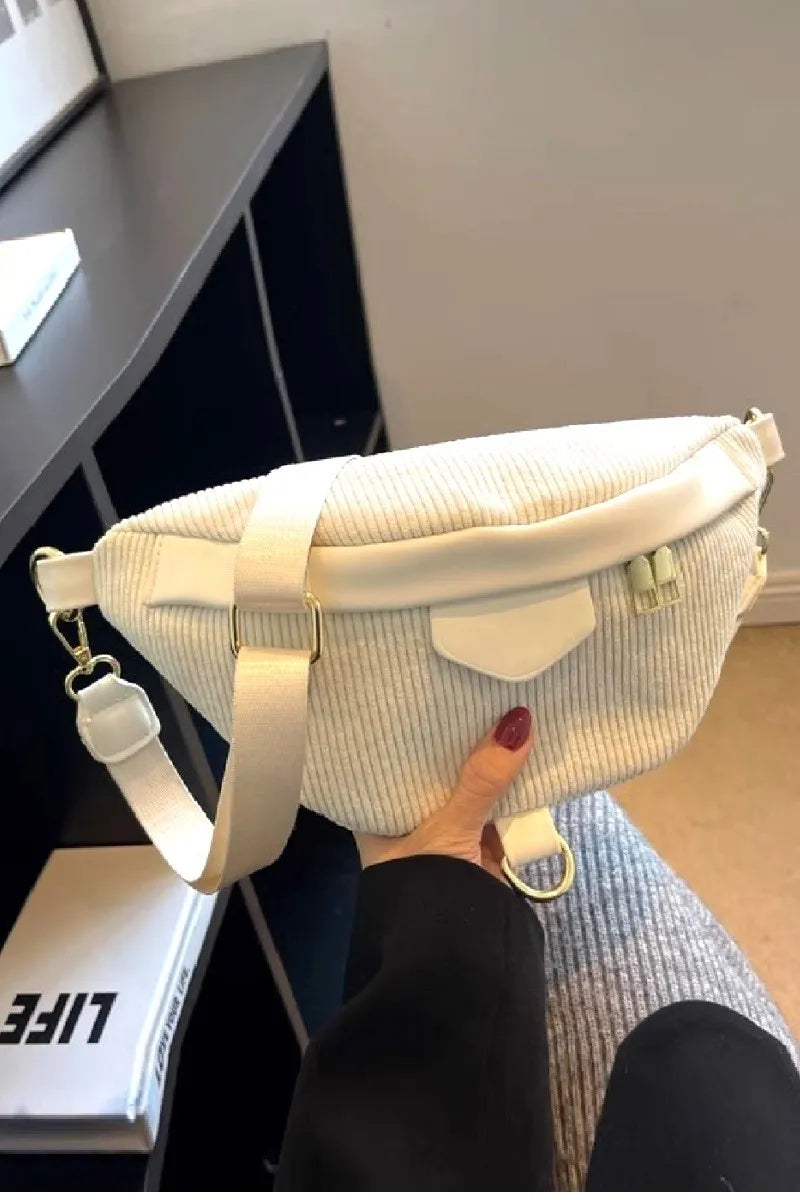 White corduroy crossbody bag with removable adjustable strap and zipper closure