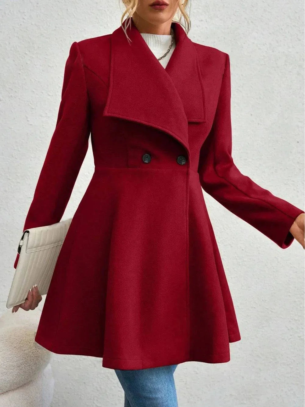 Women's collared neck button up long sleeve coat in red polyester with flared design