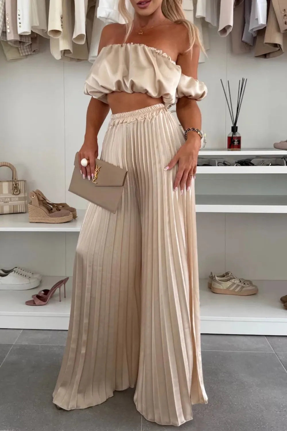 Beige off-shoulder ruffled top and pleated wide-leg pants two-piece set