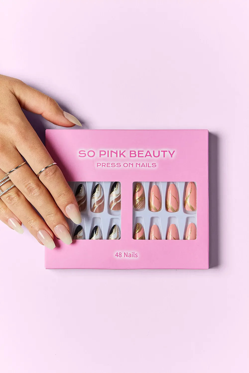 So Pink Beauty Press On Nails 48-piece set with two nail designs and glue in pink packaging