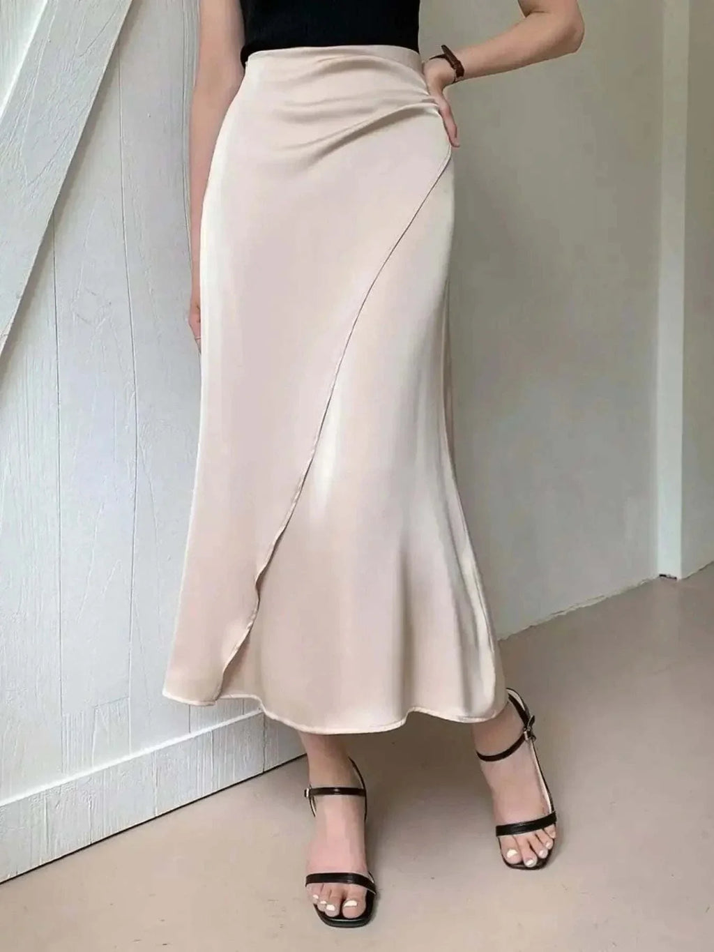Asymmetric Midi Skirt with Fluted Hem.