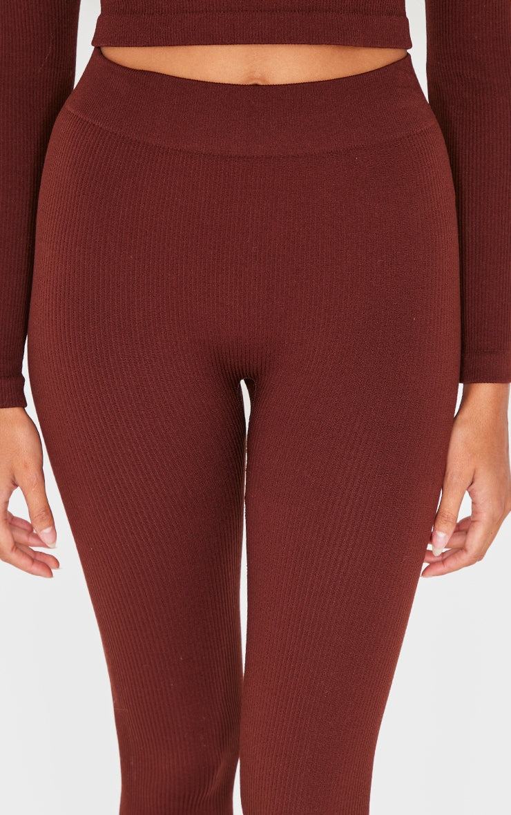 Brown structured contour ribbed leggings with a high waist and fitted design