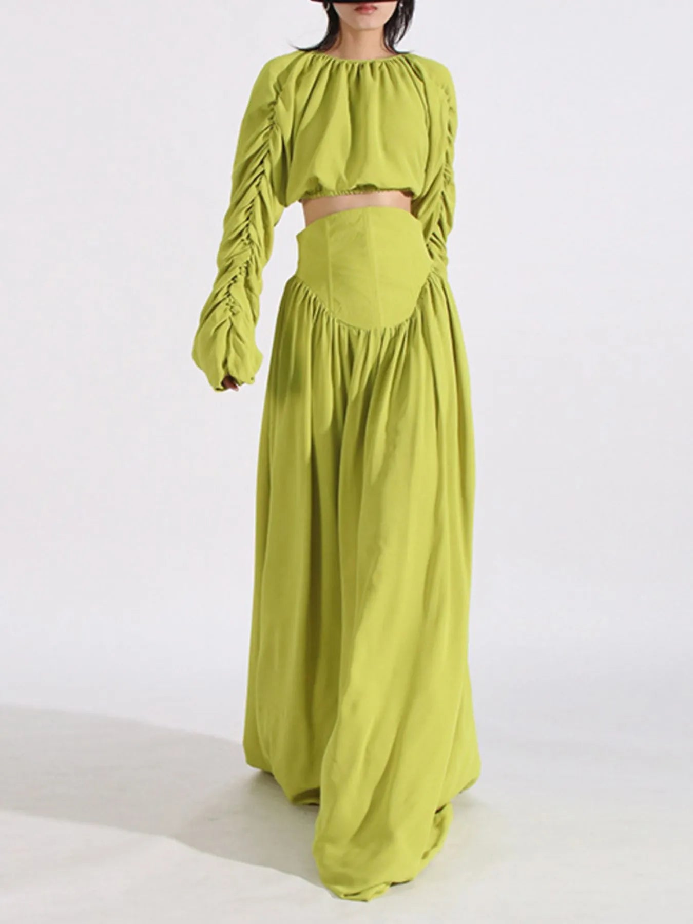 Green ruched long sleeve top and high waist skirt set with tied details, slightly stretchy polyester fabric.