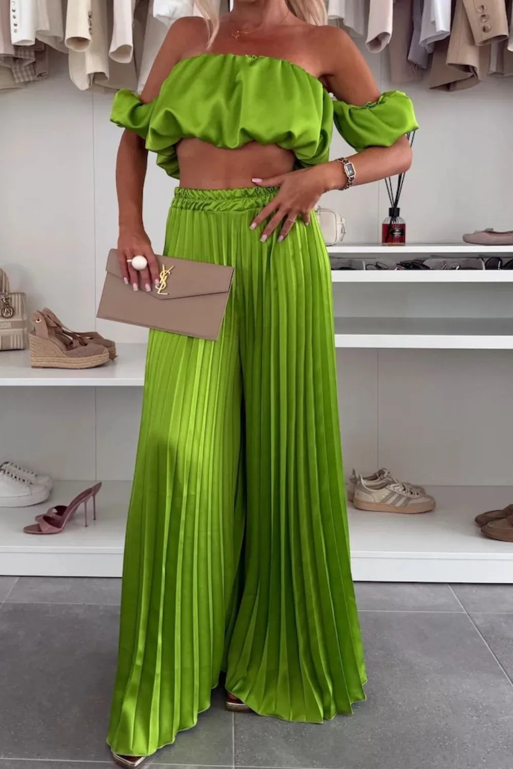 Green off-shoulder ruffled top with pleated wide-leg pants two-piece set