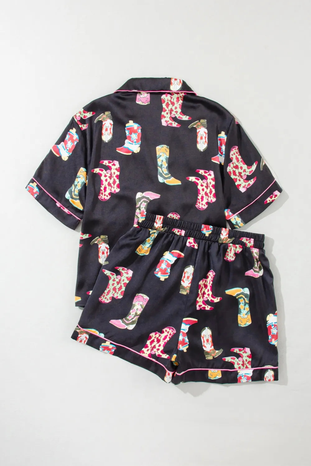 Printed button up short sleeve top and shorts lounge set with colorful boot print on black fabric