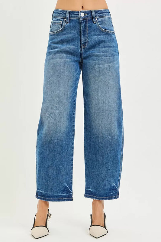 RISEN slouchy cropped barrel jeans in medium blue denim with a relaxed fit and barrel leg design.