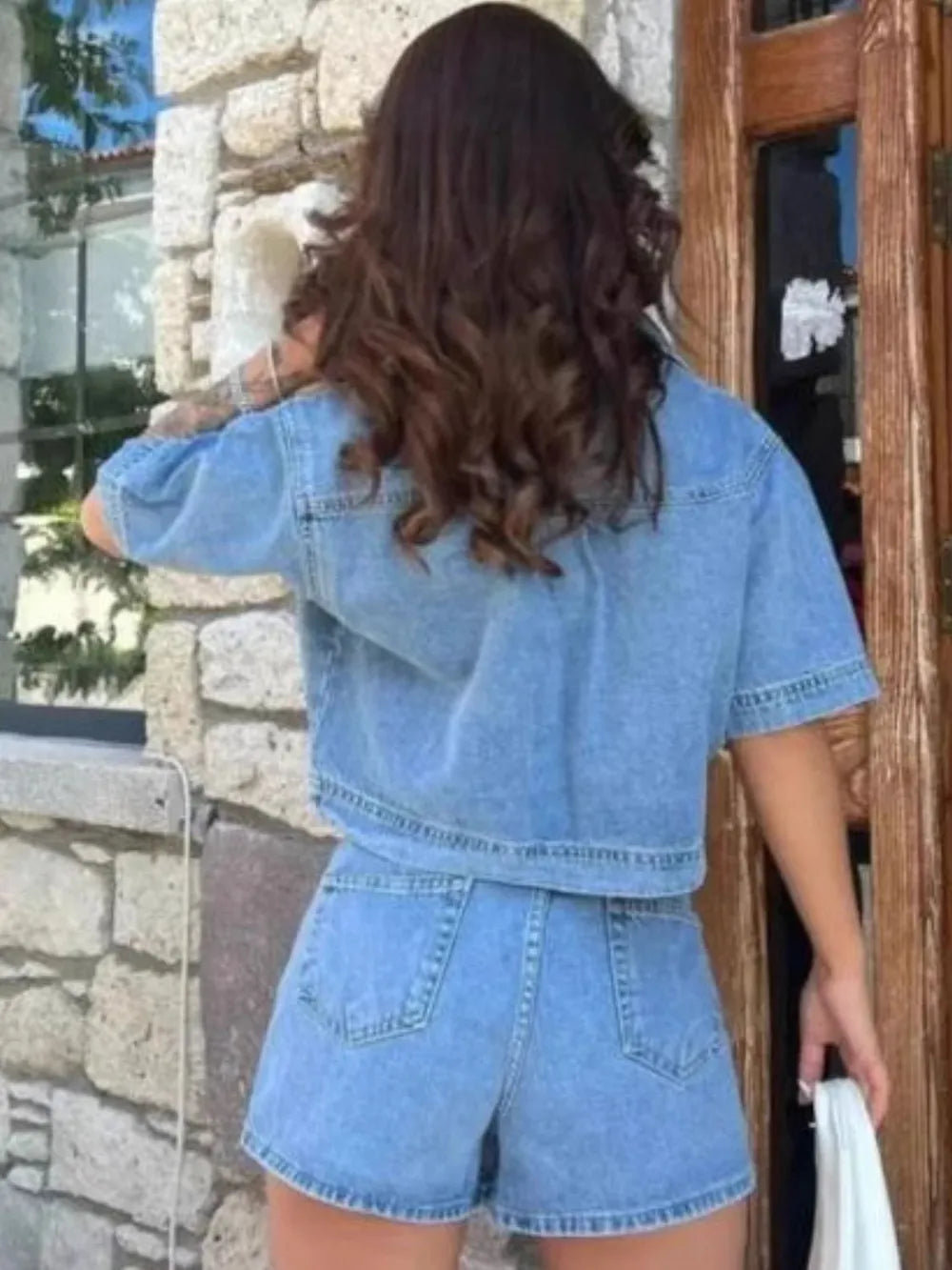 Woman wearing Johnny Collar Short Sleeve Top and Skort Denim Set back view