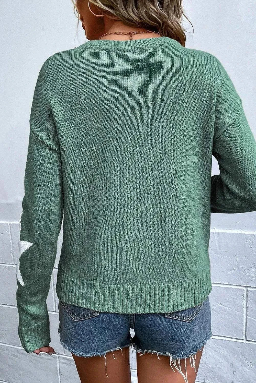 Green Star Round Neck dropped shoulder sweater with ribbed hem and white star detail on sleeve back view
