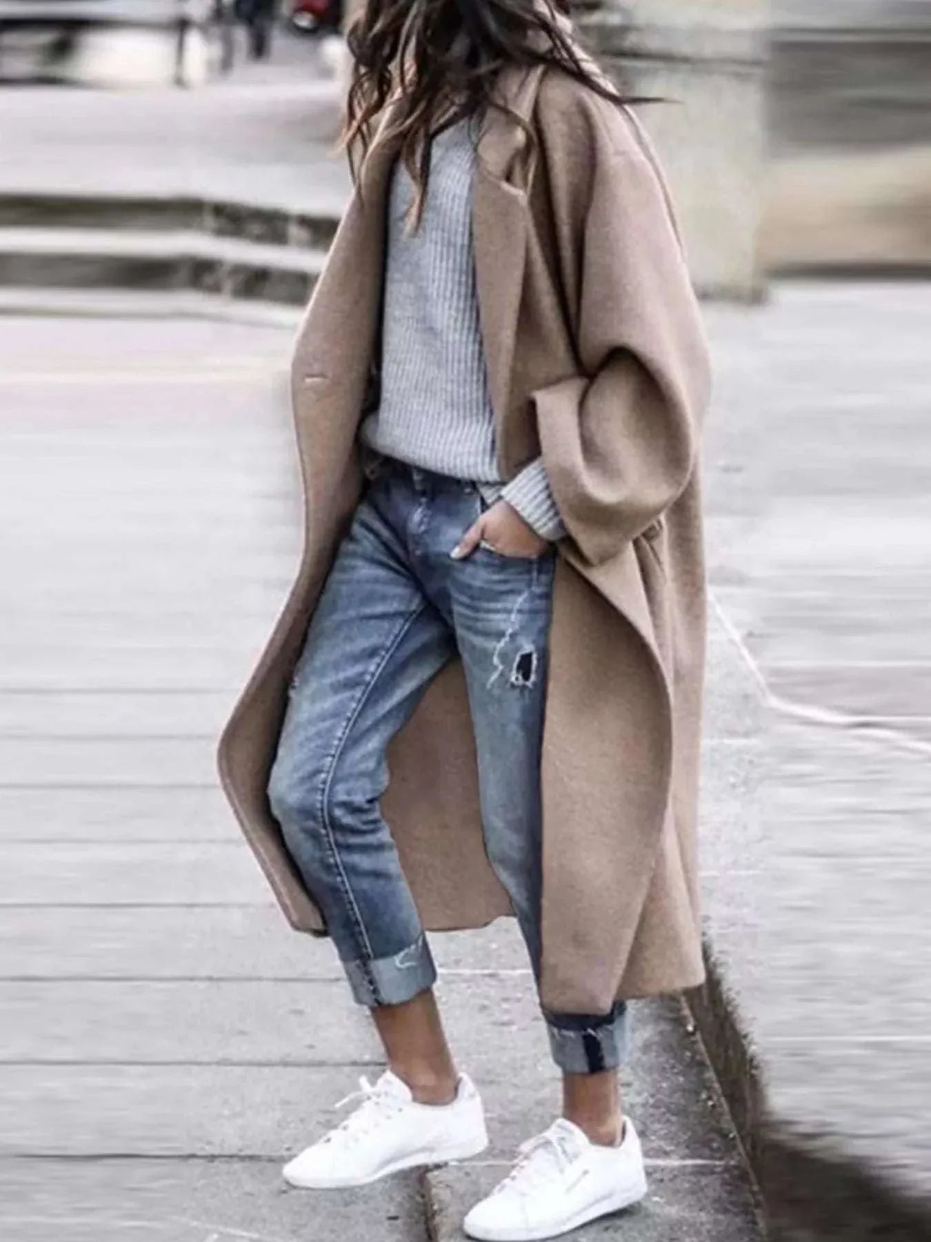 full size wool blend longline overcoat in beige worn with casual jeans and sneakers