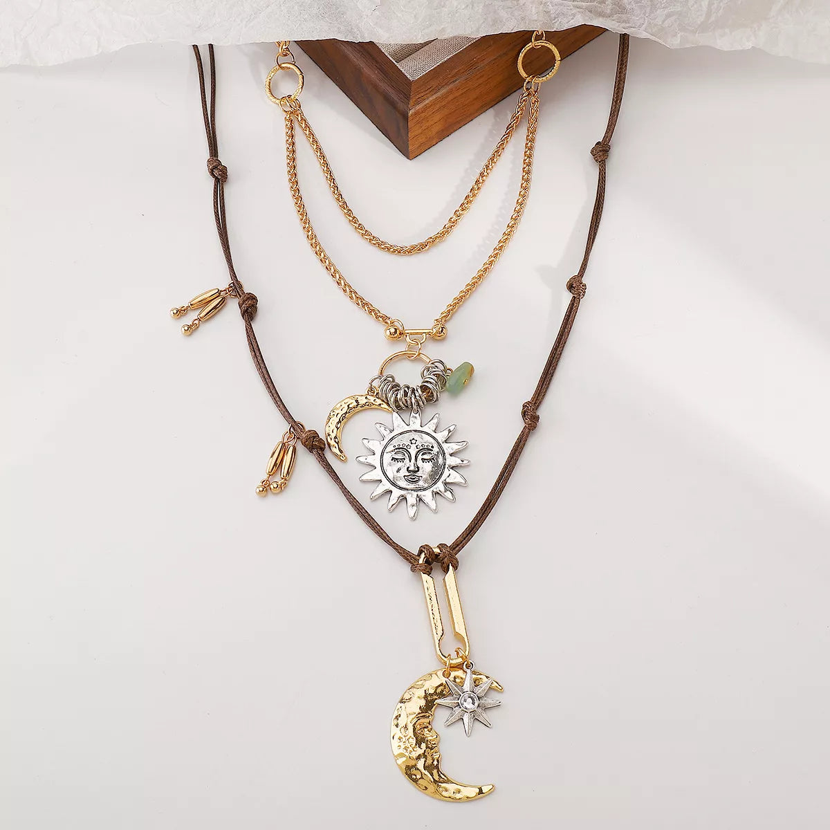 Moon & Sun Pendant necklace with 18K gold-plated and silver-plated alloy in layered chain styles