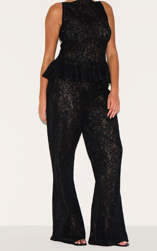 Plus Black Sheer Lace Flared Leg TrouserFinished with intricate detailing, these trousers are made from a black sheer lace material with a flattering flared high waisted fit. For the perfect co-ord, style Redemption By Ashley NorthPlus Black Sheer Lace