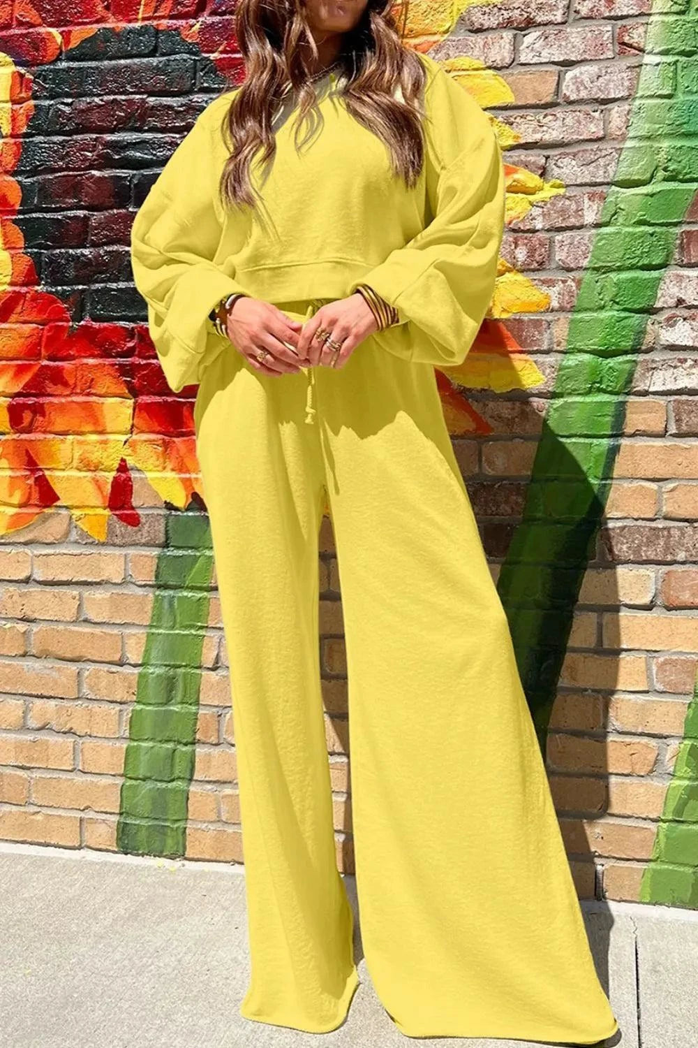 Yellow round neck long sleeve sweatshirt and wide-leg pants set for women