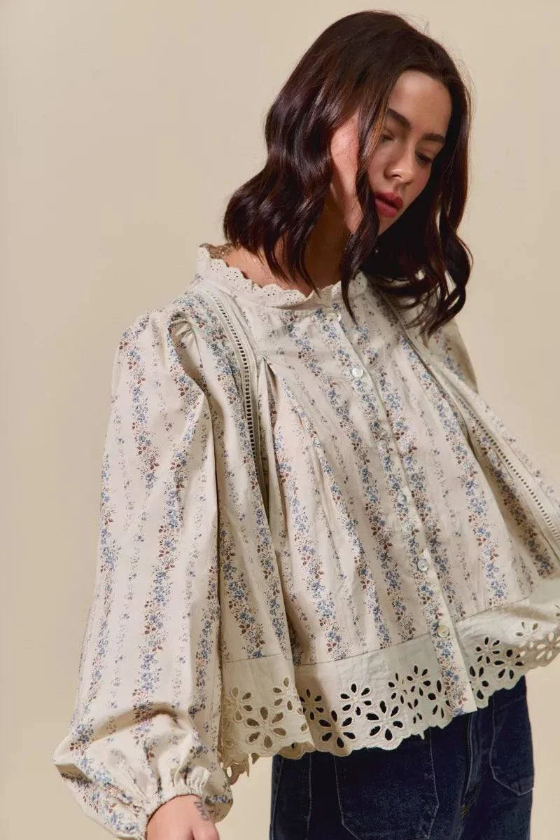 floral print lace button-down shirt with ruffled sleeves and eyelet lace detailing on beige fabric