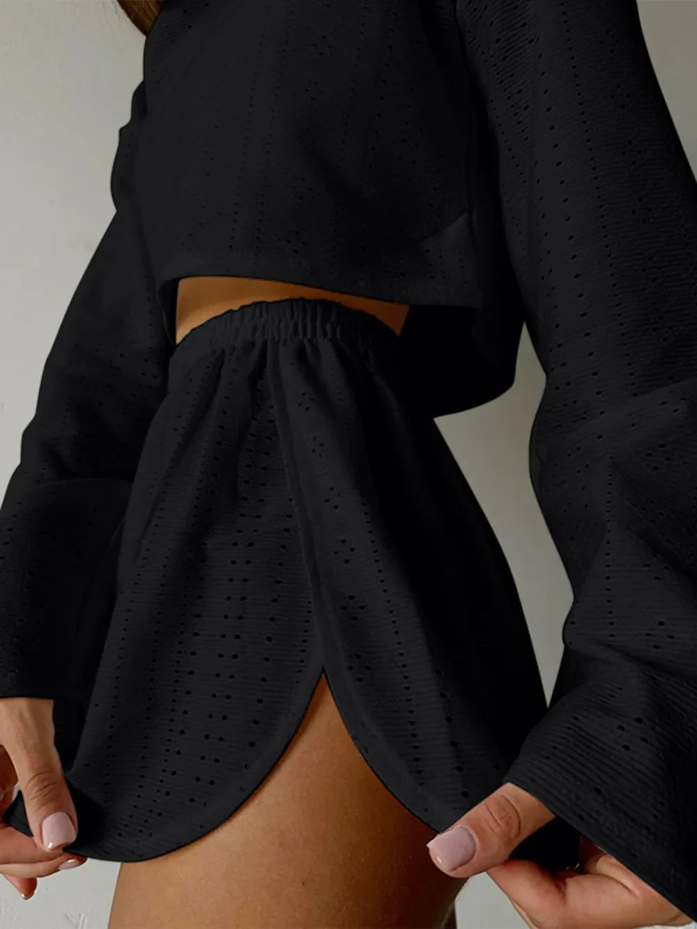 Black eyelet round neck top and shorts set with slightly stretchy fabric and long bell sleeves