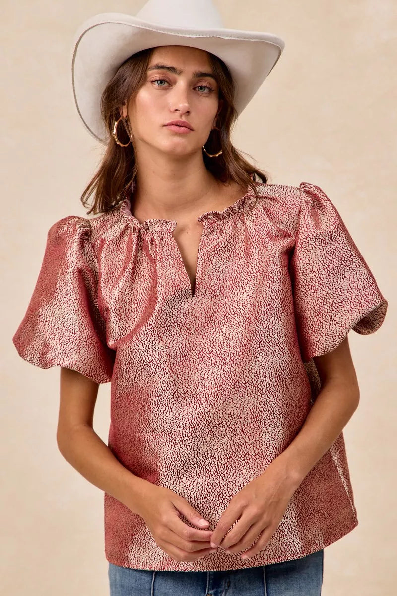 Woman wearing BiBi Jacquard Woven short balloon sleeve V-neck top with ruffled detailing and textured fabric