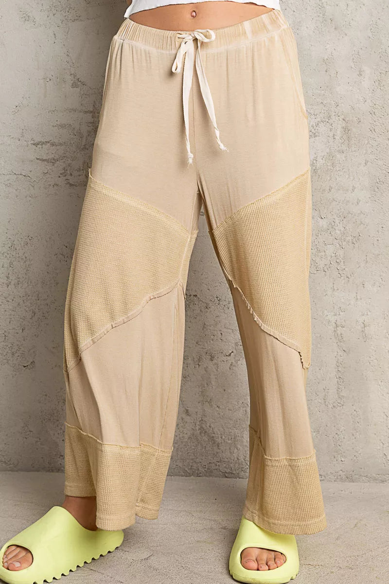POL elastic waistband wide leg pants with drawstring and ribbed texture in beige color