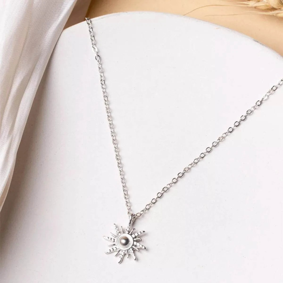 Sunburst Pendant NecklacePieces:1-piece
Material:18K Gold-Plated,Zinc alloy,Silver-plated
Care instructions:Avoid wearing during exercise, as sweat will react with the jewelry to produce silSunburst Pendant Necklace