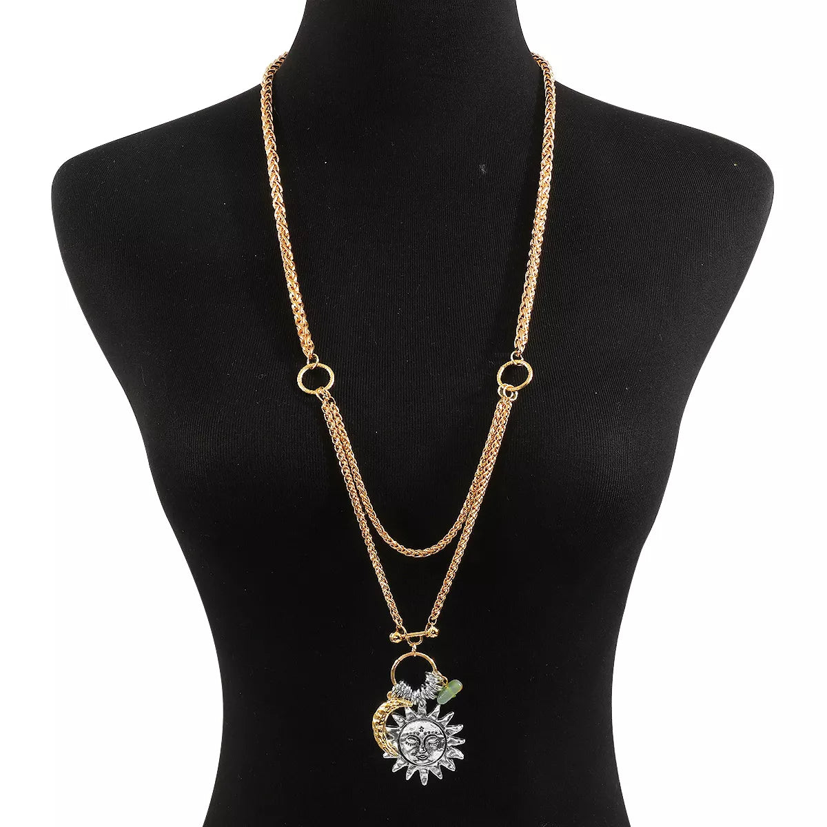 Moon and Sun Pendant Necklace with double gold-plated chains on black display bust