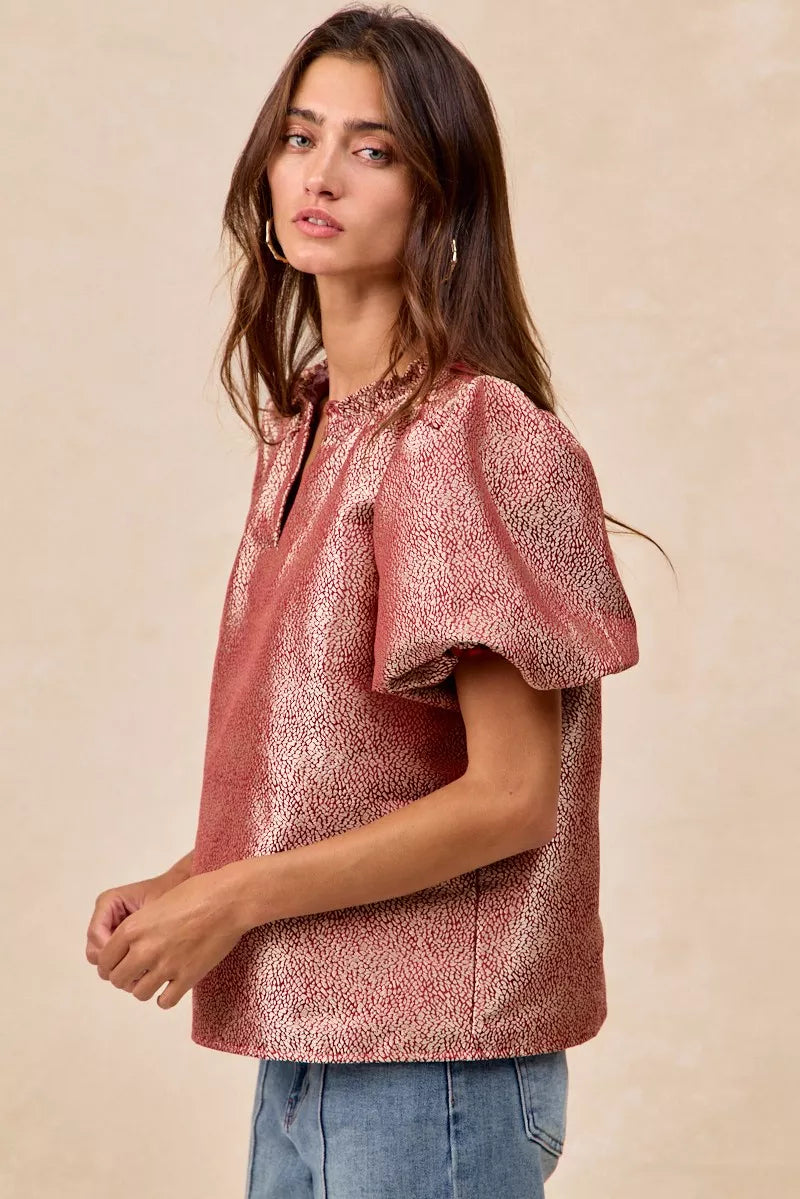 BiBi Jacquard Woven short balloon sleeves V neck top in textured pink fabric modeled with jeans