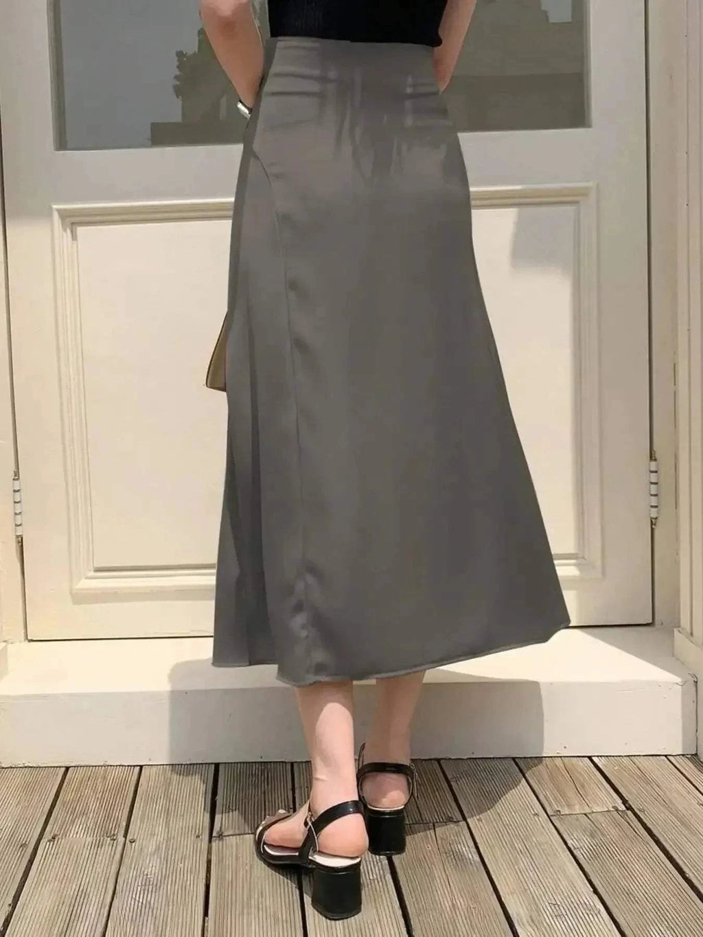 Asymmetric Midi Skirt with Fluted Hem.