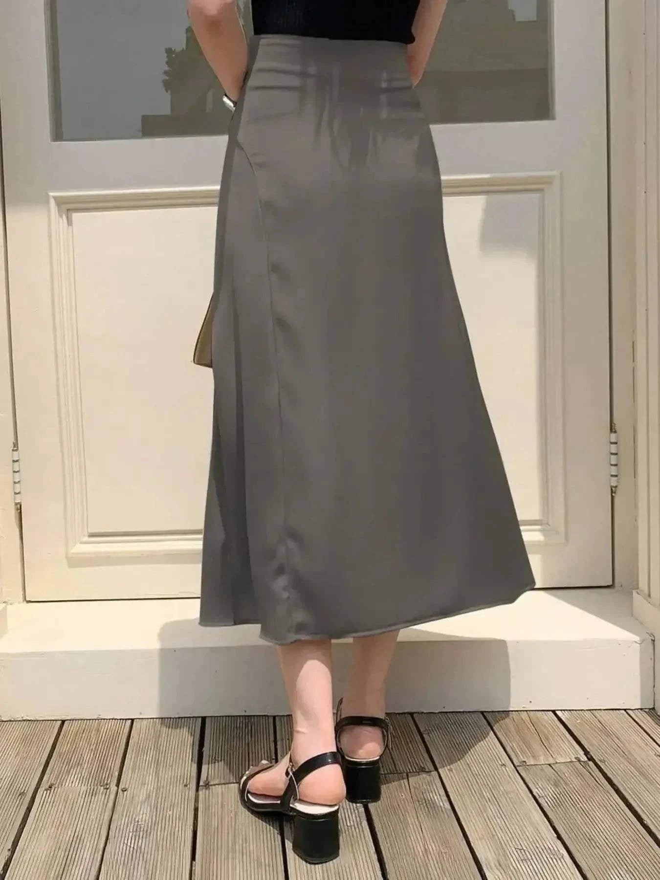 Asymmetric Midi Skirt with Fluted Hem.