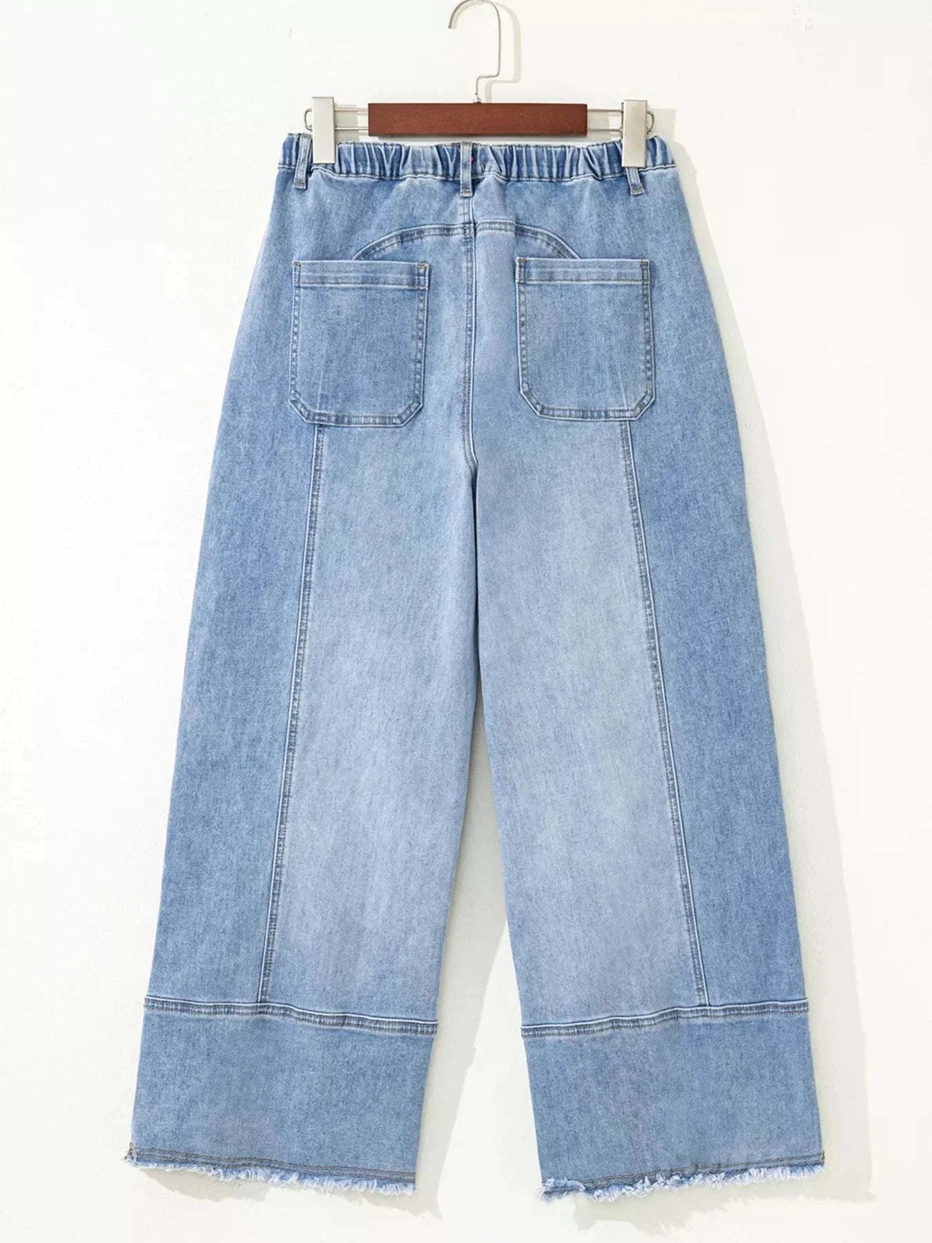 Wide Leg Drawstring Raw Hem JeansFeatures:Pocketed,Drawstring
Stretch:Slightly stretchy
Material composition:75% cotton, 23% polyester, 2% elastane
Care instructions:Machine wash cold. Tumble dry loRedemption By Ashley NorthWide Leg Drawstring Jeans