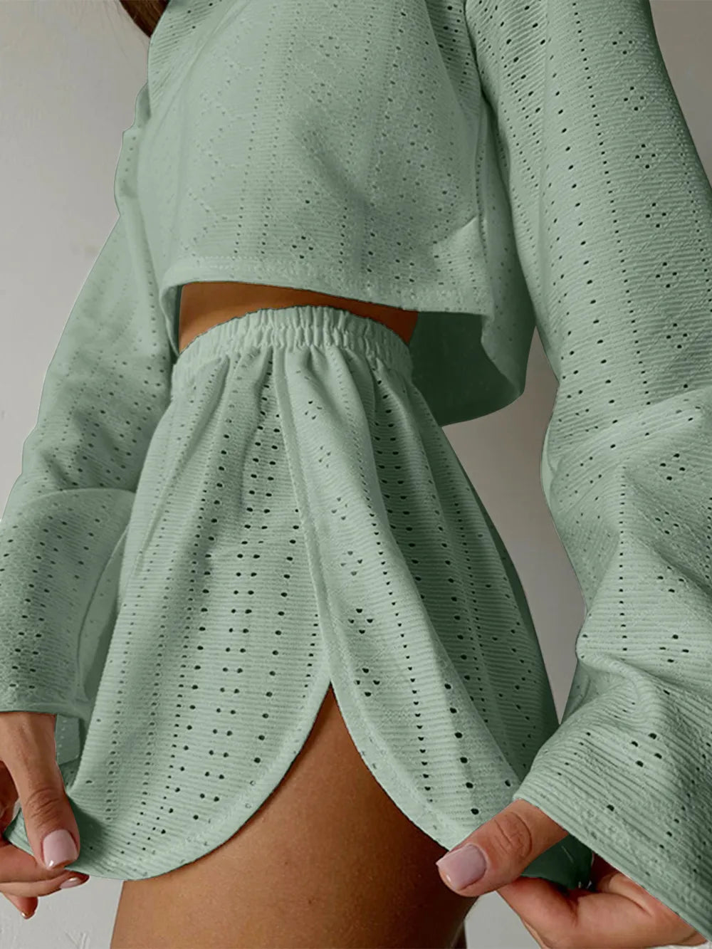 Light green eyelet round neck top and shorts set with slightly stretchy fabric