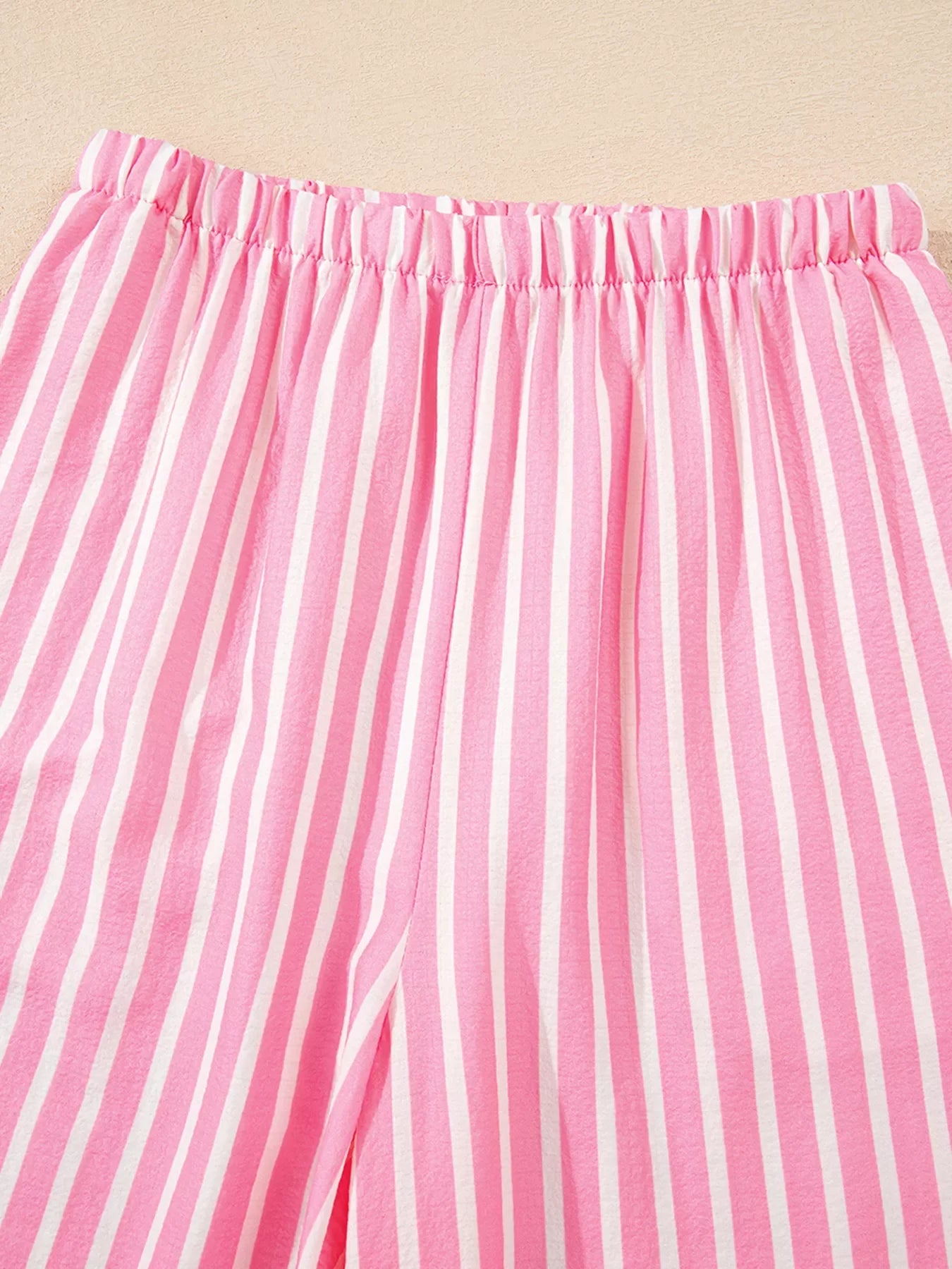Pink and white stripe buttoned front long sleeve top and pants two-piece sleepwear set detail