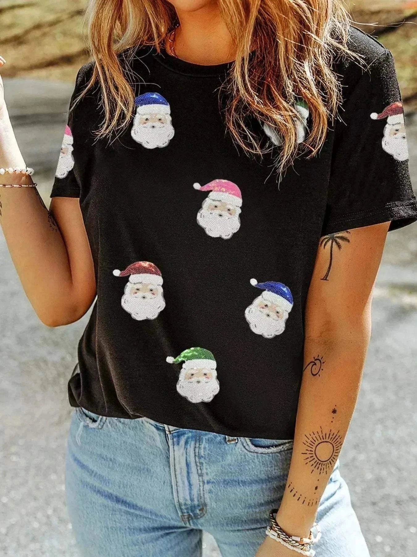 Christmas Santa T Shirt with Sequin Short SleevesStylish Christmas Santa T Shirt – Embrace the Holiday Spirit!Spread holiday cheer with our exquisite Christmas Santa T Shirt featuring delightful sequin short sleeveRedemption By Ashley Northsanta shirt