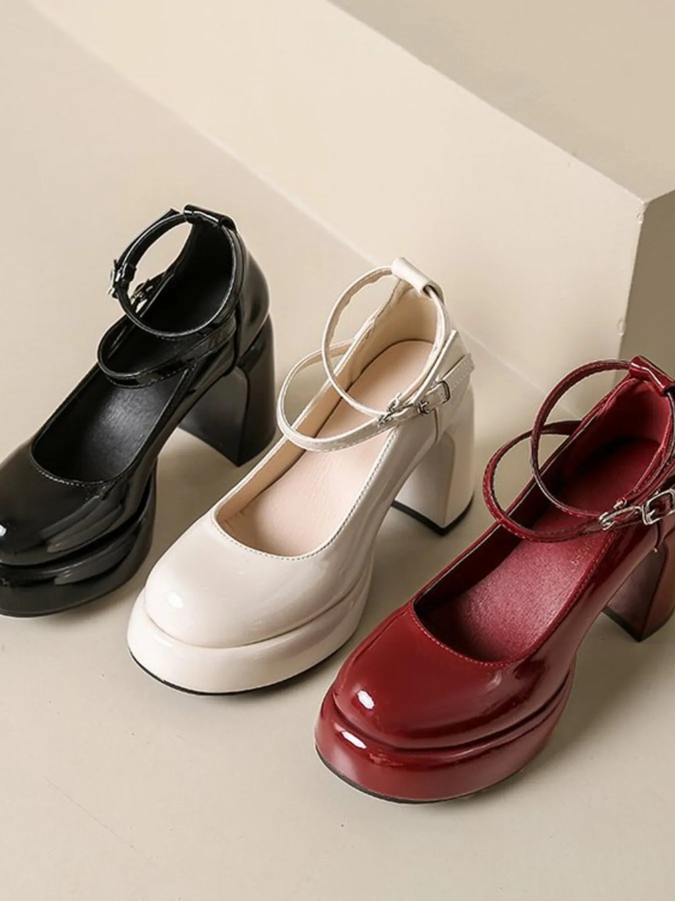 Patent Leather Mary Jane Platform Pumps.