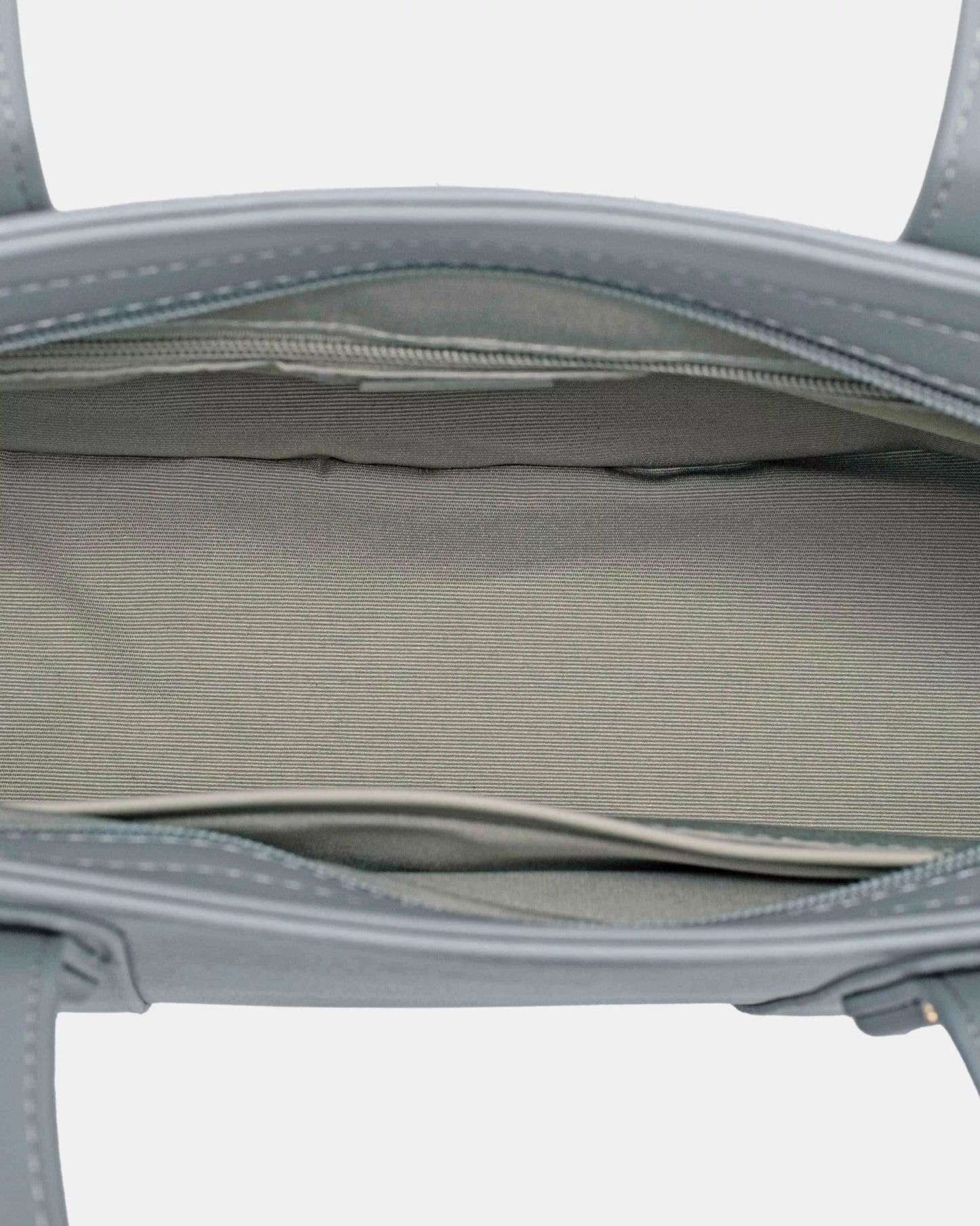 Interior view of David Jones leather tote bag with gray lining and zippered pocket