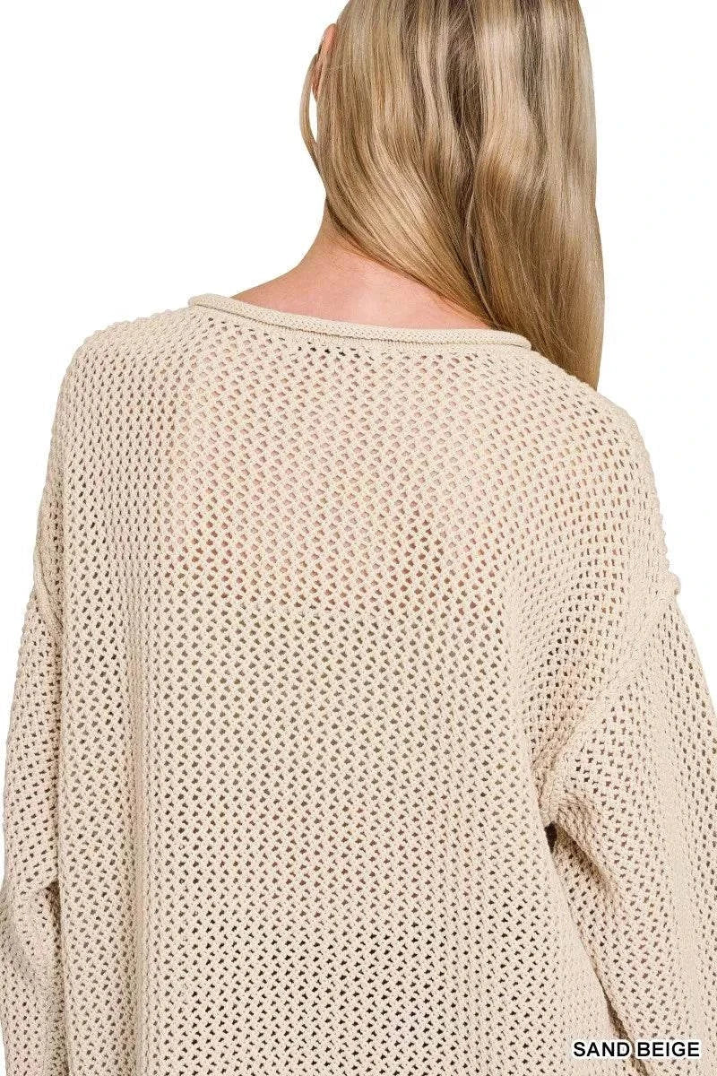Back view of sand beige openwork knit sweater with crew neck and ribbed hem and cuffs
